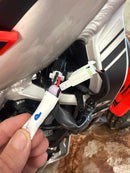 Beta Sincro CDI protection device shown connected beneath the frame